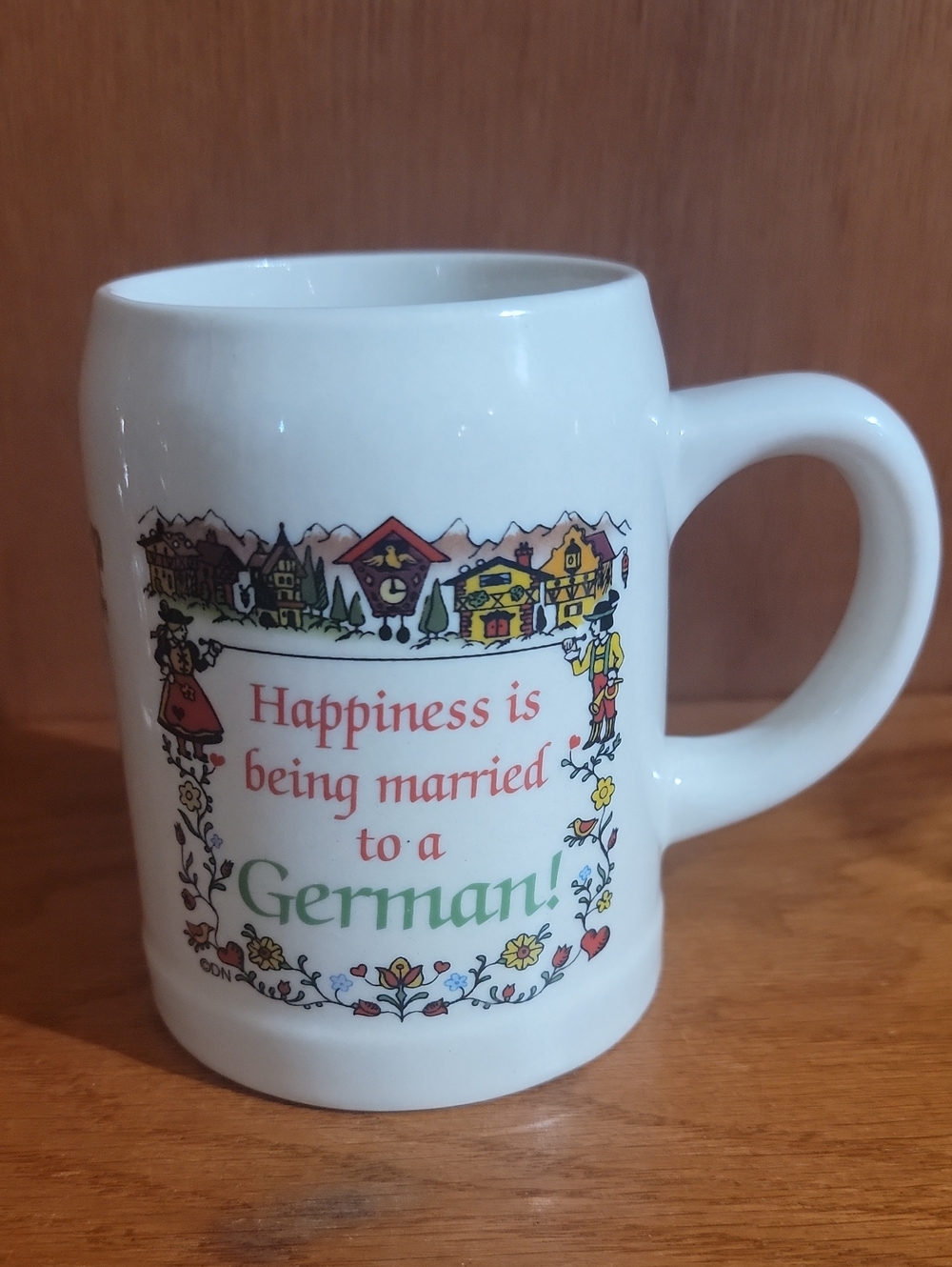White Ceramic Mug with 'Happiness is being married to a German' Design
